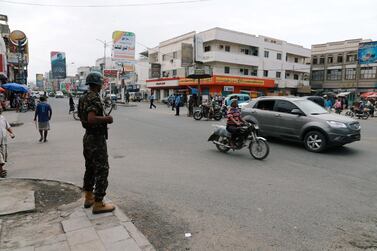 A trooper guards a street in Yemen's Red Sea port city of Hodeidah. Reuters