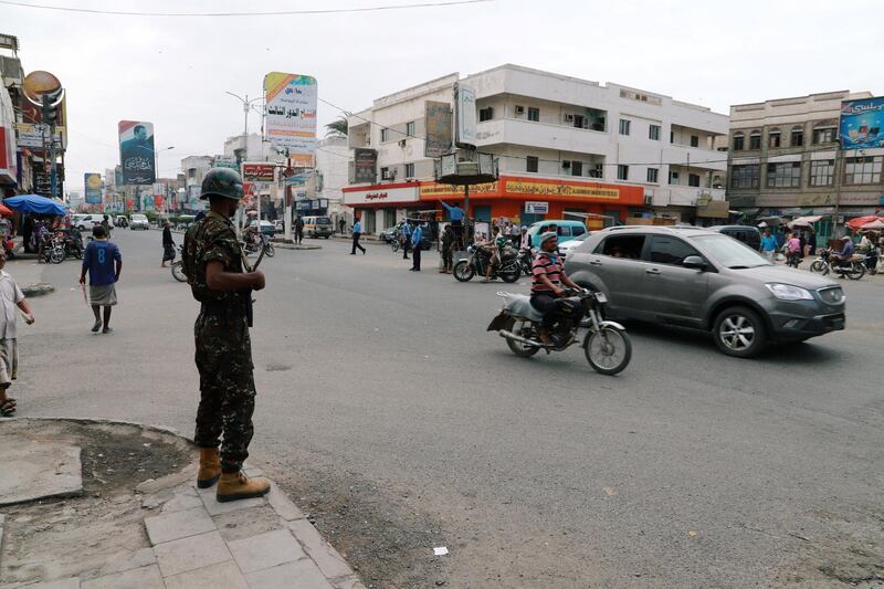 Police trooper stands guard on a street in the Red Sea port city of Hodeidah, Yemen February 13, 2019. REUTERS/Abduljabbar Zeyad