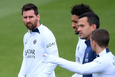 Paris Saint-Germain's Argentine forward Lionel Messi (L) looks on during a training session in Saint-Germain-en-Laye, in the north-western outskirts of Paris, on May 12, 2023, on the eve of the L1 football match against Ajaccio.  (Photo by FRANCK FIFE  /  AFP)