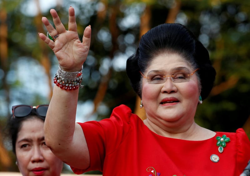 FILE PHOTO: Philippines Former First Lady and Congresswoman Imelda Marcos waves to supporters as she takes part in the announcement of her son BongBong Marcos' vice-presidential candidacy, in Manila Philippines October 10, 2015.  REUTERS/Erik De Castro/File Photo