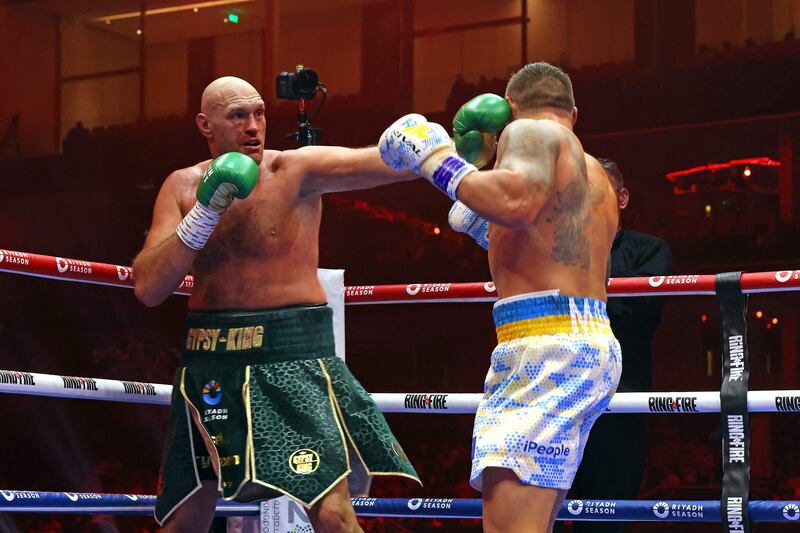 Tyson Fury throws a jab at Oleksandr Usyk during their undisputed world title fight in Riyadh. AFP