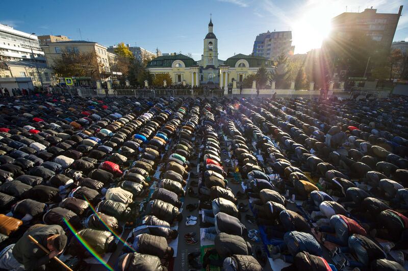 Kyrgyz Muslims pray on the first day of the Eid Al Adha in Moscow.