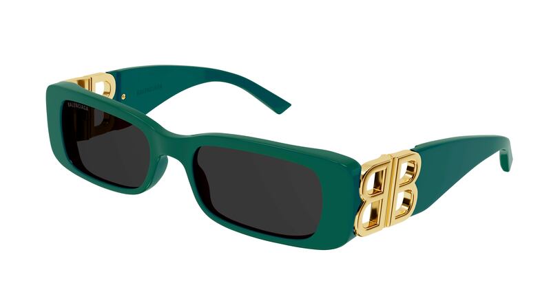 Viridian green wrap-around Dynasty sunglasses with gold double B accent, Dh1,261, Balenciaga. Photo: Balenciaga