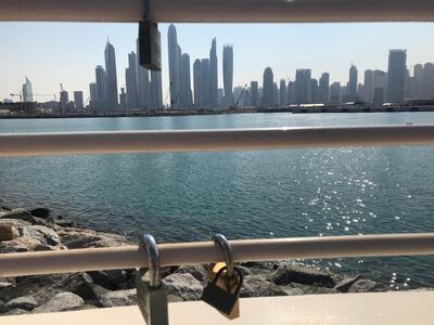 A handful of padlocks, or love locks, on a fence on Palm Jumeirah, Dubai. Farah Andrews / The National 