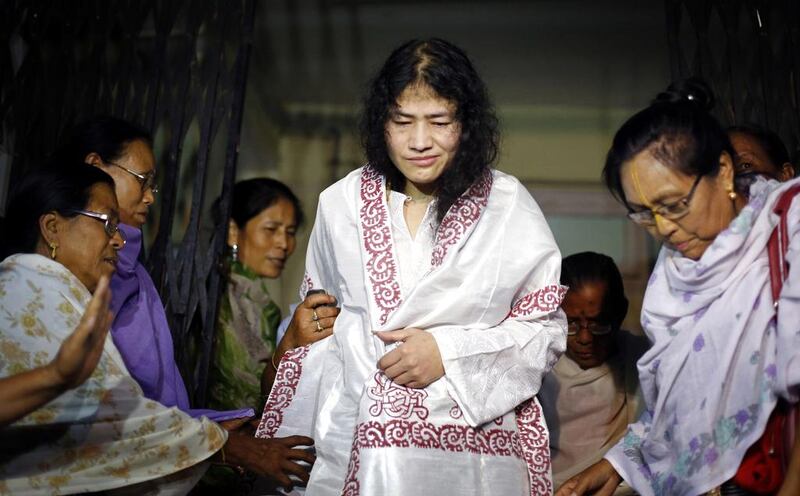 Indian rights activist Irom Sharmila, centre, has been on hunger strike against India’s Armed Forces Special Powers Act (AFSPA) for 15 years. India’s supreme court on July 8, 2016 removed the legal immunity that the armed forces have enjoyed for decades under the AFSPA.  AFPPhoto