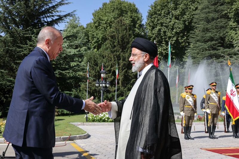 Turkish President Recep Tayyip Erdogan meets Iranian President Ebrahim Raisi in Tehran before talks involving Russia. AFP