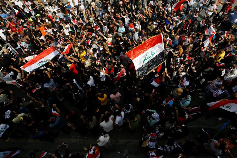 Iraqi demonstrators gather to mark the first anniversary of the anti-government protests in Baghdad. REUTERS