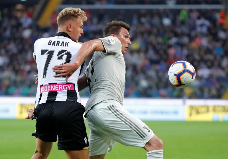Udinese's Antonin Barak in action with Mandzukic. Reuters