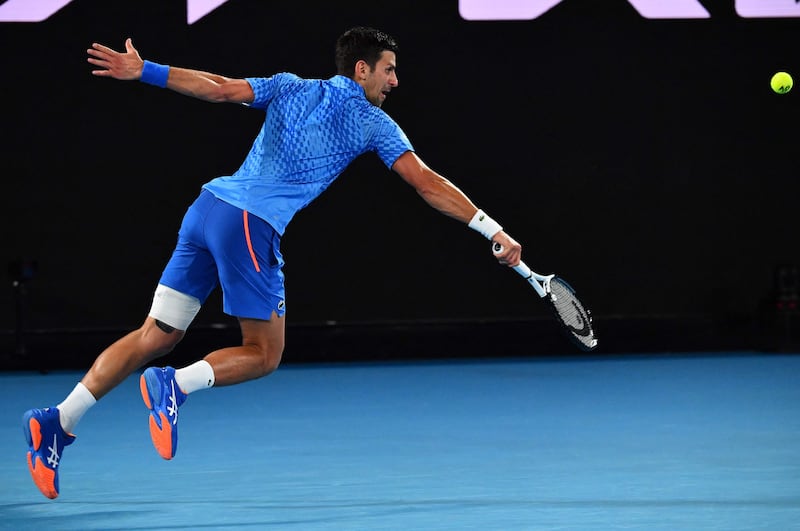 Novak Djokovic hits a return against Roberto Carballes Baena. AFP