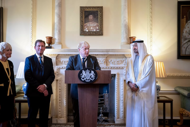 Boris Johnson and Sheikh Mohamed bin Zayed in front of an audience of businessmen, bankers and senior politicians at Downing Street. Ministry of Presidential Affairs