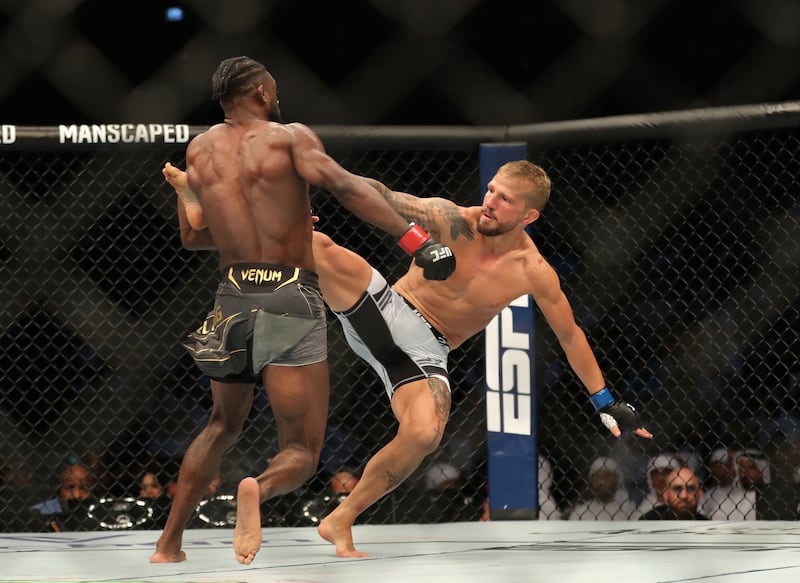 Aljamain Sterling battles with TJ Dillashaw in the bantamweight title fight. Chris Whiteoak / The National