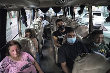 Commuters ride a bus in the Nabaa neighbourhood of Beirut, Lebanon. NurPhoto via Getty Images