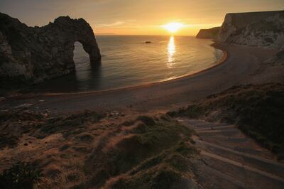 The Durdle Door in Dorset. The natural limestone arch near Lulworth is one of the highlights of the Jurassic Coast, a World Heritage Site.  Getty Images