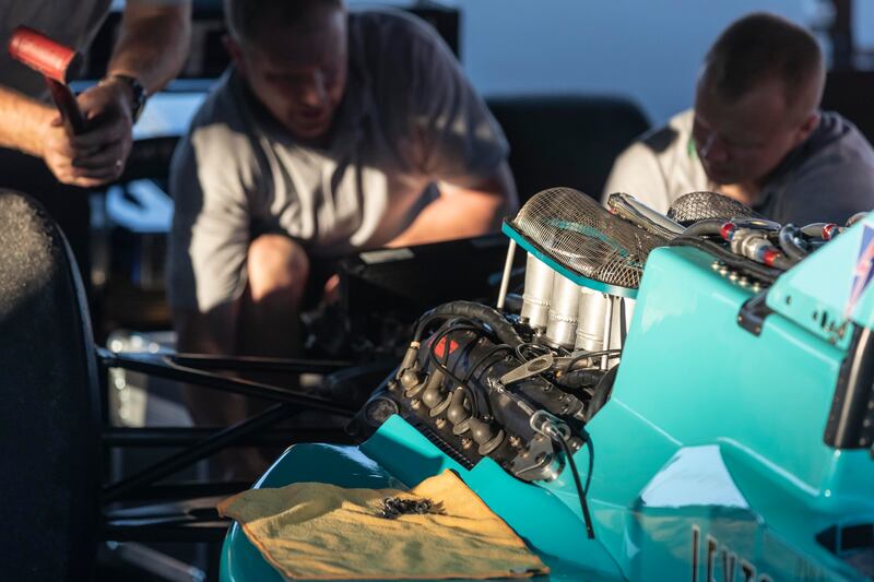 Last rays of sunlight on the prep day as teams get ready with final adjustments to their cars