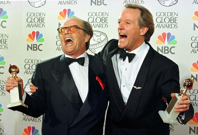 Fonda (R) and actor Jack Nicholson laugh after their wins at the 55th Annual Golden Globe Awards in Beverly Hills, January 18 1998. Fonda won for best performance by an actor in a motion picture- drama for the movie 'Ulee's Gold'. Nicholson won for Best Actor for his film 'As Good As It Gets'.