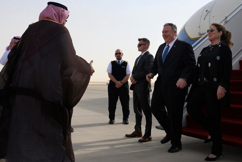 US Secretary of State Mike Pompeo, second right, and his wife Susan are met by a member of Saudi protocol as they arrive in Riyadh.  AP