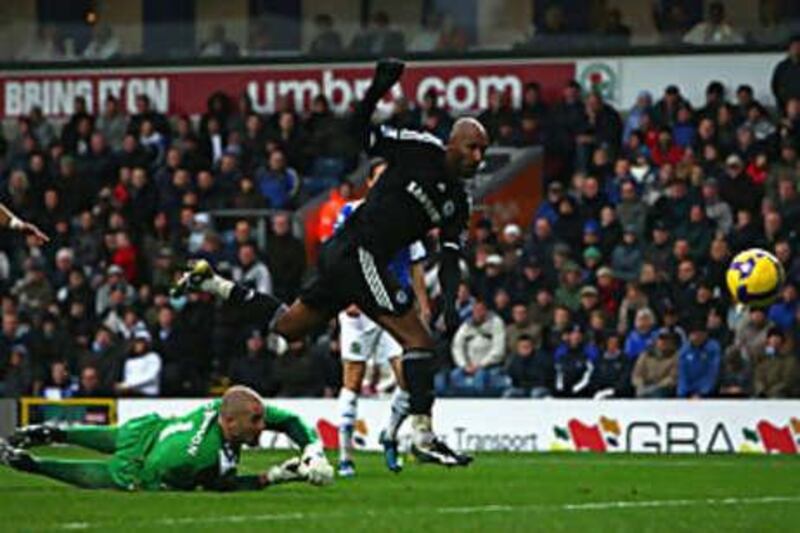 Nicolas Anelka slots home his and Chelsea's second goal during their win at Blackburn Rovers.