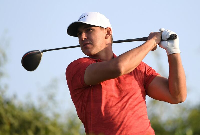 Brooks Koepka of the United States plays off the 11th tee in round one of the Abu Dhabi Championship golf tournament in Abu Dhabi, United Arab Emirates, Wednesday, Jan. 16, 2019. (AP Photo/Martin Dokoupil)