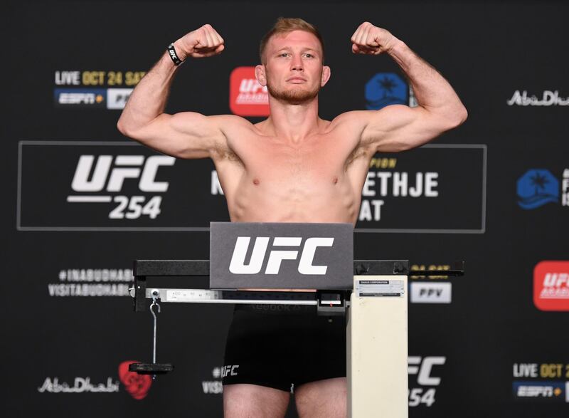 ABU DHABI, UNITED ARAB EMIRATES - OCTOBER 23: Casey Kenney poses on the scale during the UFC 254 weigh-in on October 23, 2020 on UFC Fight Island, Abu Dhabi, United Arab Emirates. (Photo by Josh Hedges/Zuffa LLC)