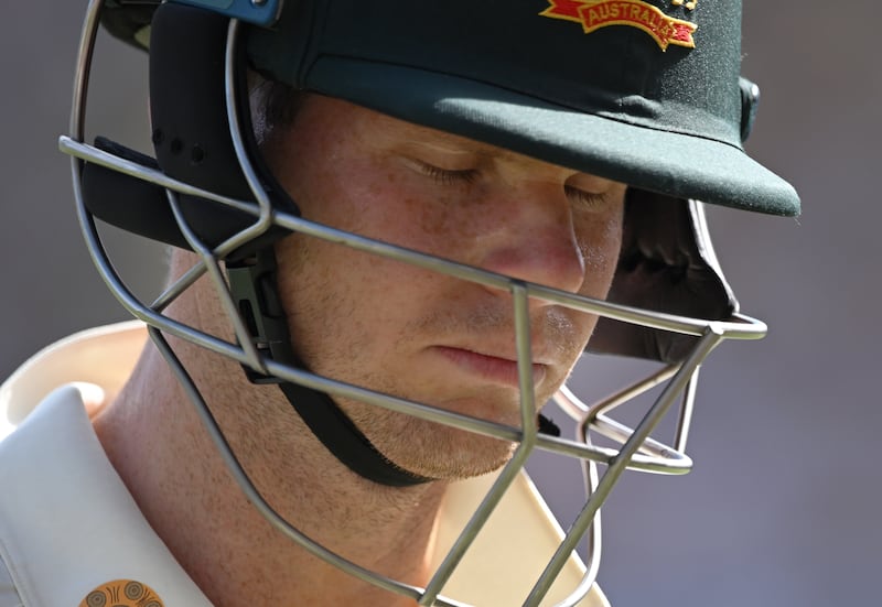 Australian batsman Steve Smith reacts after he was dismissed. EPA