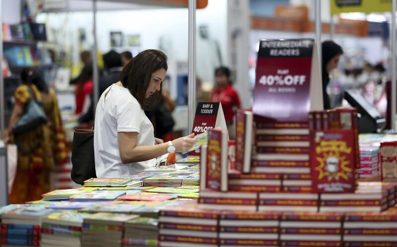 ABU DHABI,  UNITED ARAB EMIRATES , April 24 – 2019 :- Visitors browsing books at the Abu Dhabi International Book Fair held at Abu Dhabi National Exhibition Centre in Abu Dhabi. ( Pawan Singh / The National ) For News/Online/Instagram. Story by Rupert