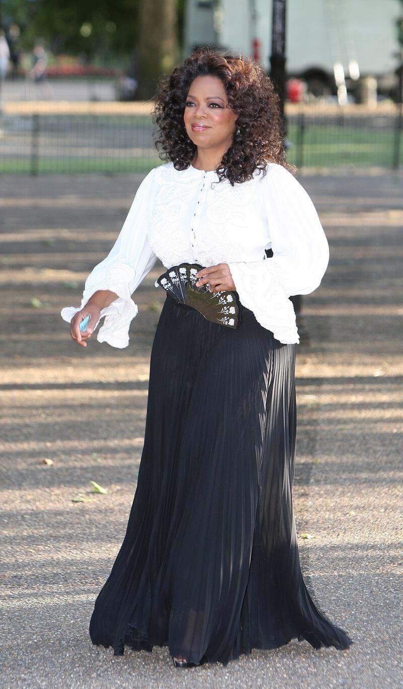 LONDON - JUNE 25: TV presenter Oprah Winfrey arrives at the dinner in honour of Nelson Mandela, celebrating his 90th birthday, at Hyde Park on June 25, 2008 in London, England. The dinner will raise funds for Madiba's global charity projects, The Nelson Mandela Foundation and 46664. (Photo by Getty Images)