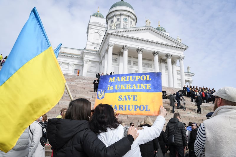 People attend a 'Free Ukraine' demonstration in Senate Square in Helsinki, Finland. EPA