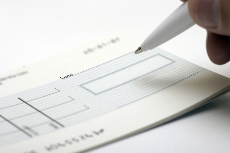 Criminal punishment related to bounced cheques has been cited as one of major obstacles to doing business in the UAE. istockphoto.com