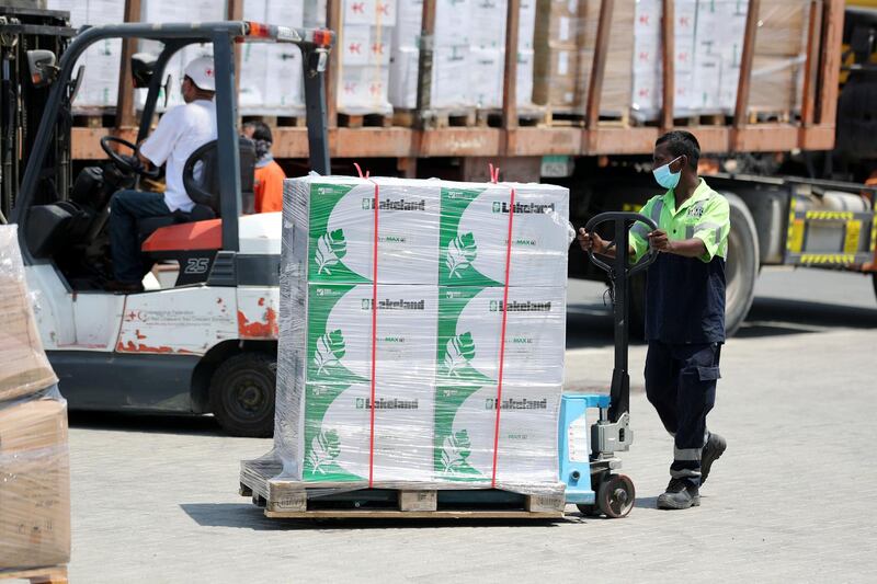 Dubai, United Arab Emirates - Reporter: Kelly Clarke. Aid is loaded onto a truck by the International Federation of Red Cross and Red Crescent Societies to support Beirut. Wednesday, August 5th, 2020. Dubai. Chris Whiteoak / The National