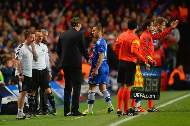 Paris Saint-Germain manager Laurent Blanc shakes hands with Eden Hazard of Chelsea as he is replaced by Andre Schurrle of Chelsea during Tuesday night's Champions League match. Mike Hewitt / Getty Images / April 8, 2014