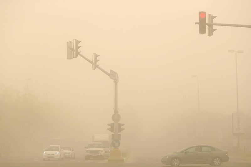 ABU DHABI, UNITED ARAB EMIRATES - - -  April 2, 2015 --- Visibility was very low in Abu Dhabi on Thursday morning, April 2, 2015, as a sandstorm ravaged through the city and keeping traffic slow.  ( DELORES JOHNSON / The National )  ***** Reporter is not listed **** *** Local Caption ***  DJ-0402-NA-Weather-011.jpg