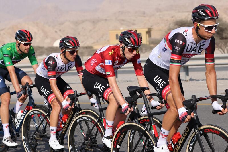 Team UAE Emirates' Tadej Pogacar wearing the leader's red jersey during Stage 4. AFP
