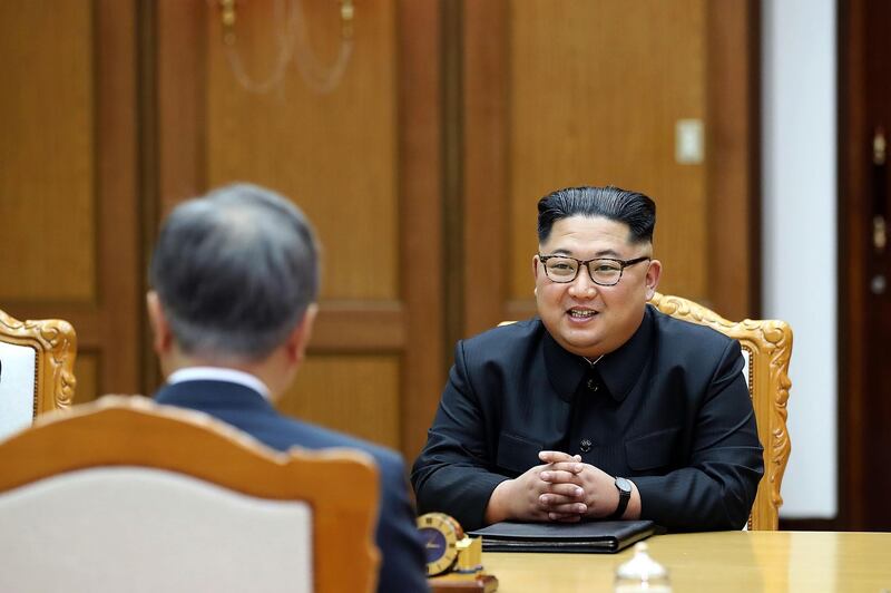 PANMUNJOM, NORTH KOREA - MAY 26: In this handout image provided by South Korean Presidential Blue House, South Korean President Moon Jae-in talks with North Korean leader Kim Jong-un during their meeting on May 26, 2018 in Panmunjom, North Korea. North and South Korean leaders held the surprise second summit after U.S. President Donald Trump cancelled the meeting with Kim Jong-un scheduled for June 12. Trump has since indicated that the meeting could take place a day after.  (Photo by South Korean Presidential Blue House via Getty Images)