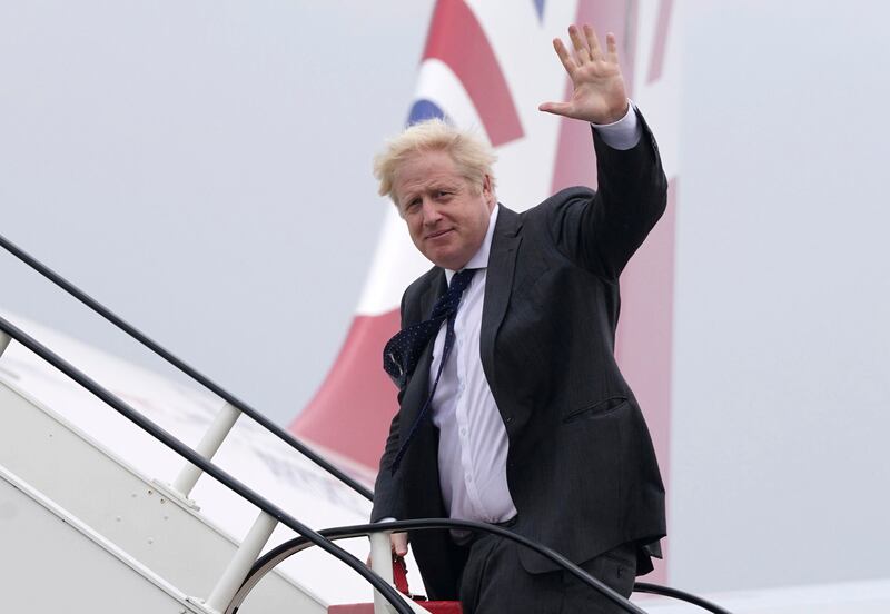 Britain's Prime Minister Boris Johnson boards RAF Voyager at Stansted Airport, ahead of a meeting with US President Joe Biden in Washington. AP Photo