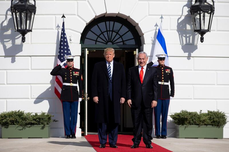 US President Donald Trump (left) greets Prime Minister of Israel Benjamin Netanyahu (right) upon his arrival at the South Portico of the White House, in Washington.  EPA