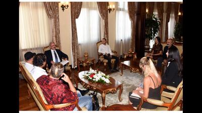 The movie crew at the office of Antalya Governor Munir Karaloglu discussing the film. 