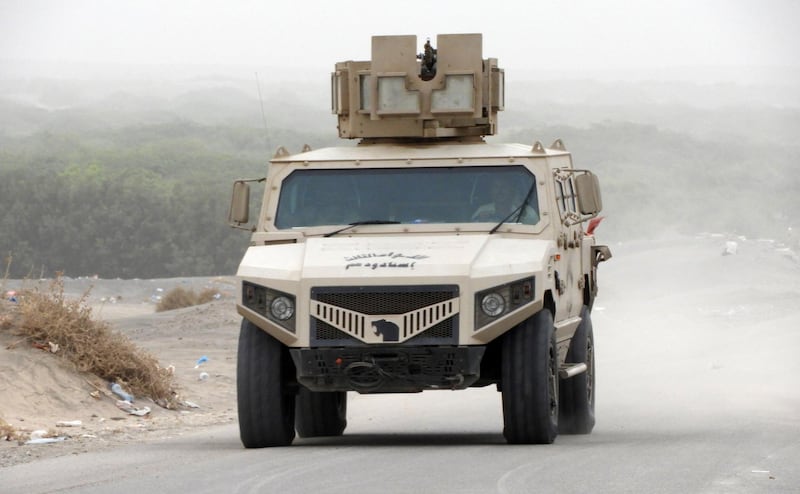 An armoured vehicle belonging to Yemeni pro-government forces arrives in al-Durayhimi district, about nine kilometres south of Hodeidah international airport on June 13, 2018. Yemeni forces backed by the Saudi-led coalition launched an offensive on June 13 to retake the rebel-held Red Sea port city of Hodeida, pressing toward the airport south of the city.
The port serves as the entry point for 70 percent of the impoverished country's imports as it teeters on the brink of famine. / AFP / NABIL HASSAN
