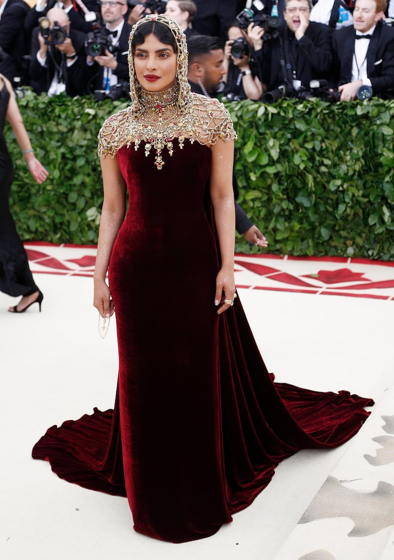 epa06718052 Priyanka Chopra arrives on the red carpet for the Metropolitan Museum of Art Costume Institute's benefit celebrating the opening of the exhibit 'Heavenly Bodies: Fashion and the Catholic Imagination' in New York, New York, USA, 07 May 2018. The exhibit will be on view at the Metropolitan Museum of Art's Costume Institute from 10 May to 08 October 2018.  EPA-EFE/JUSTIN LANE