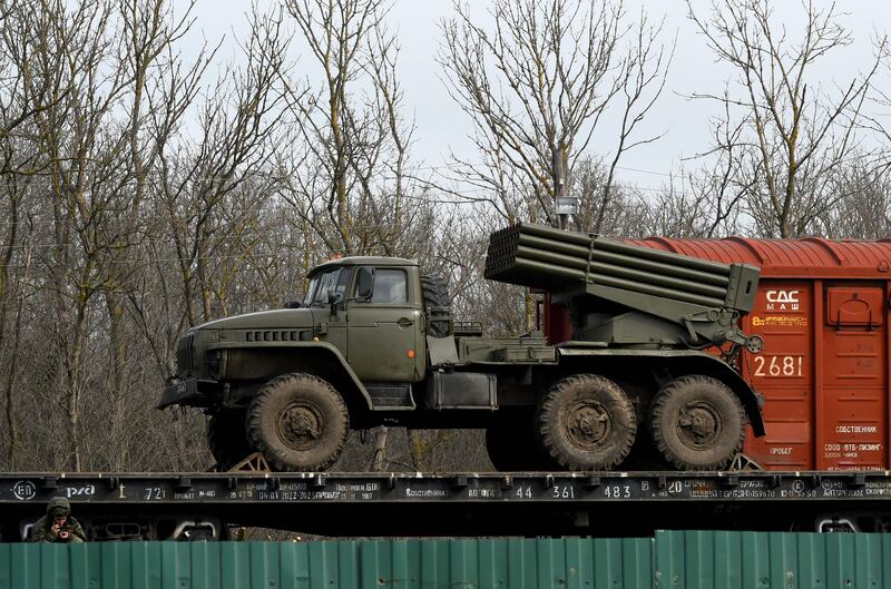 A BM-21 Grad truck is seen loaded on train platforms some 50km from the border with the self-proclaimed Donetsk People's Republic, in Russia's southern Rostov region. AFP
