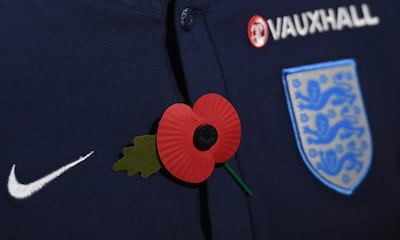 England players are now permitted to wear poppies on their shirts after Fifa amended Law 4 of the Rules of the Game banning political, religious or commercial messages on shirts or equipment. Ross Kinniard / Getty Images