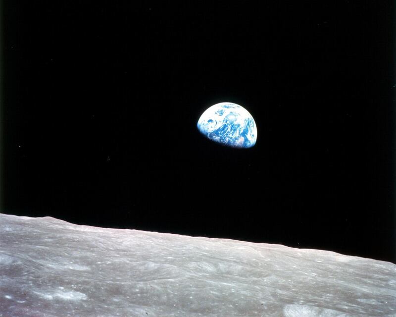 Apollo 8, the first manned mission to the moon, entered lunar orbit on Christmas Eve, Dec. 24, 1968. That evening, the astronauts-Commander Frank Borman, Command Module Pilot Jim Lovell, and Lunar Module Pilot William Anders-held a live broadcast from lunar orbit, in which they showed pictures of the Earth and moon as seen from their spacecraft. Said Lovell, "The vast loneliness is awe-inspiring and it makes you realize just what you have back there on Earth." They ended the broadcast with the crew taking turns reading from the book of Genesis.

Image Credit: NASA