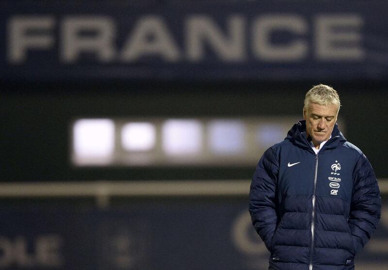 Coach Didier Deschamps is just 90 minutes away from being part of yet another stunning failure by France. Franck Fife / AFP