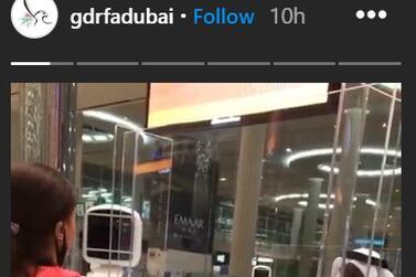 Immigrations staff at Dubai International Airport welcome first tourists back to Dubai since easing of Covid-19 travel restrictions. Courtesy GDRFA