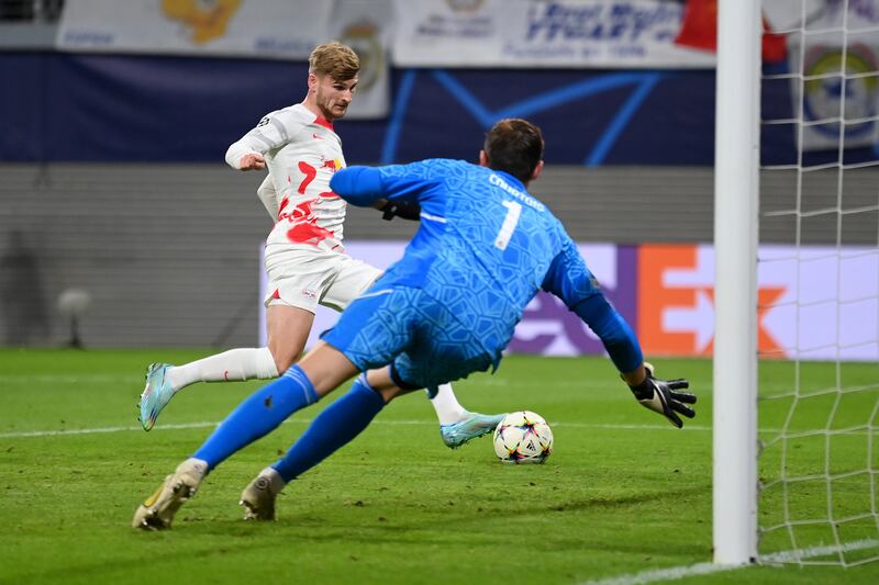 Timo Werner scores RB Leipzig's third goal past Real Madrid goalkeeper Thibaut Courtois. Getty