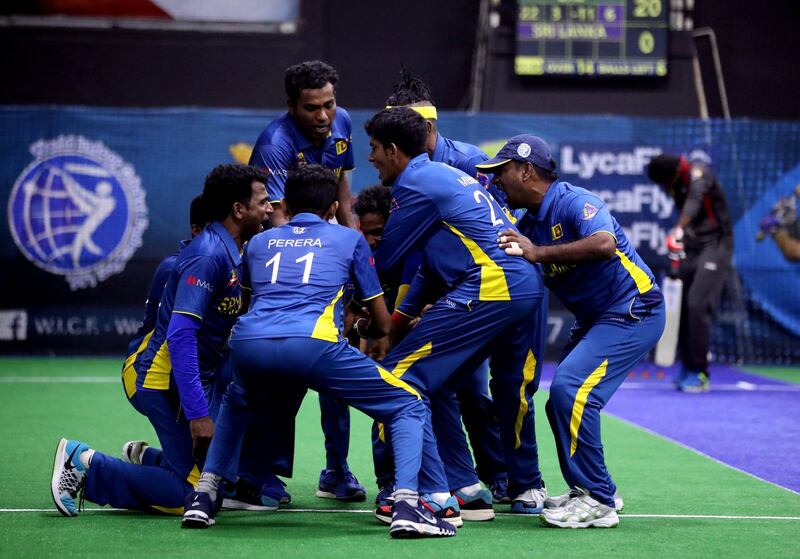 Dubai, United Arab Emirates - September 19th, 2017: Sri Lanka celebrate another wicket during the game between the UAE v Sri Lanka in the W.I.C.F Indoor cricket world cup 2017. Tuesday, Sept 19th, 2017, Insportz, Al Quoz, Dubai. Chris Whiteoak / The National