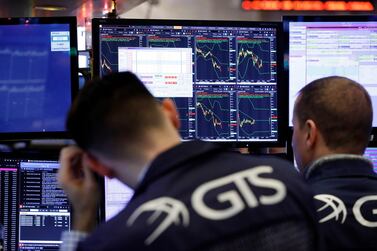 Traders on the floor of the New York Stock Exchange. A number of global themes are affecting markets. AP