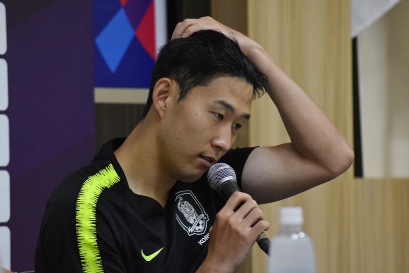 Son Heung Min (C) of South Korea talks at a press conference after the match against Kyrgyzstan in the men's football preliminary group E match of the 2018 Asian Games in Bandung on August 20, 2018. (Photo by Timur Matahari / AFP)