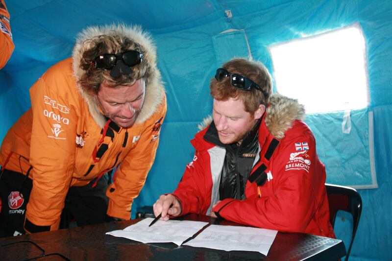 NOVO, ANTARCTICA - In this undated handout photo provided by Walking with the Wounded (WWTW) on November 23, 2013, Prince Harry, patron of Team UK in the Virgin Money South Pole Allied Challenge 2013 expedition, and Dominic West make notes of how much each individual and their kit weighs, during preparations in Novo, Antarctica. The team of 12 injured service personnel from Britain, America, Canada and Australia have overcome life-changing injuries and undertaken challenging training programmes to prepare themselves for the conditions they will face in Antarctica. Trekking around 15km to 20km per day, the teams will endure temperatures as low as minus 45C and 50mph winds as they pull their 70kg sleds to the south pole. (Photo by WWTW via Getty Images)

NOTE TO EDITORS: This handout photo may only be used in for editorial reporting purposes for the contemporaneous illustration of events, things or the people in the image or facts mentioned in the caption. Reuse of the picture may require further permission from the copyright holder.