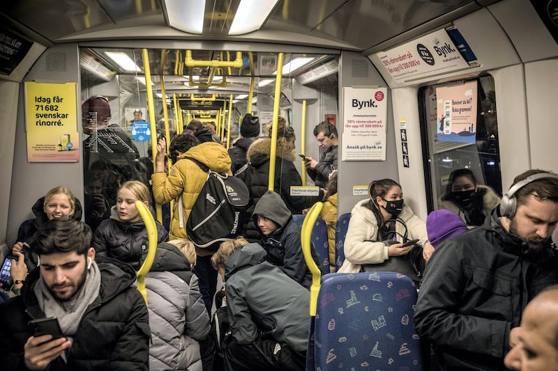 STOCKHOLM- SWEDEN - DECEMBER 4: Passengers are crammed into a packed subway car in the middle of the ongoing Covid-19 pandemic, on December 4, 2020 in Stockholm, Sweden. Over 7,000 people have died of COVID-19 in Sweden, giving the country of 10.2 million one of Europe's highest death rates per capita. (Photo by Jonas Gratzer/Getty Images)