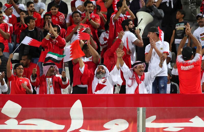 Bahrain's fans cheer for their team. AFP
